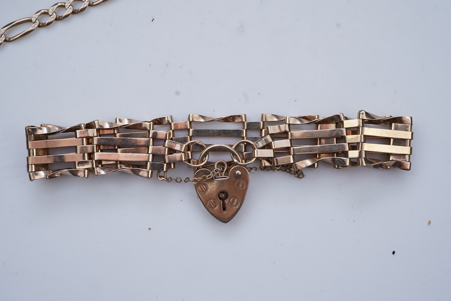 Two gold bracelets and a gold watch